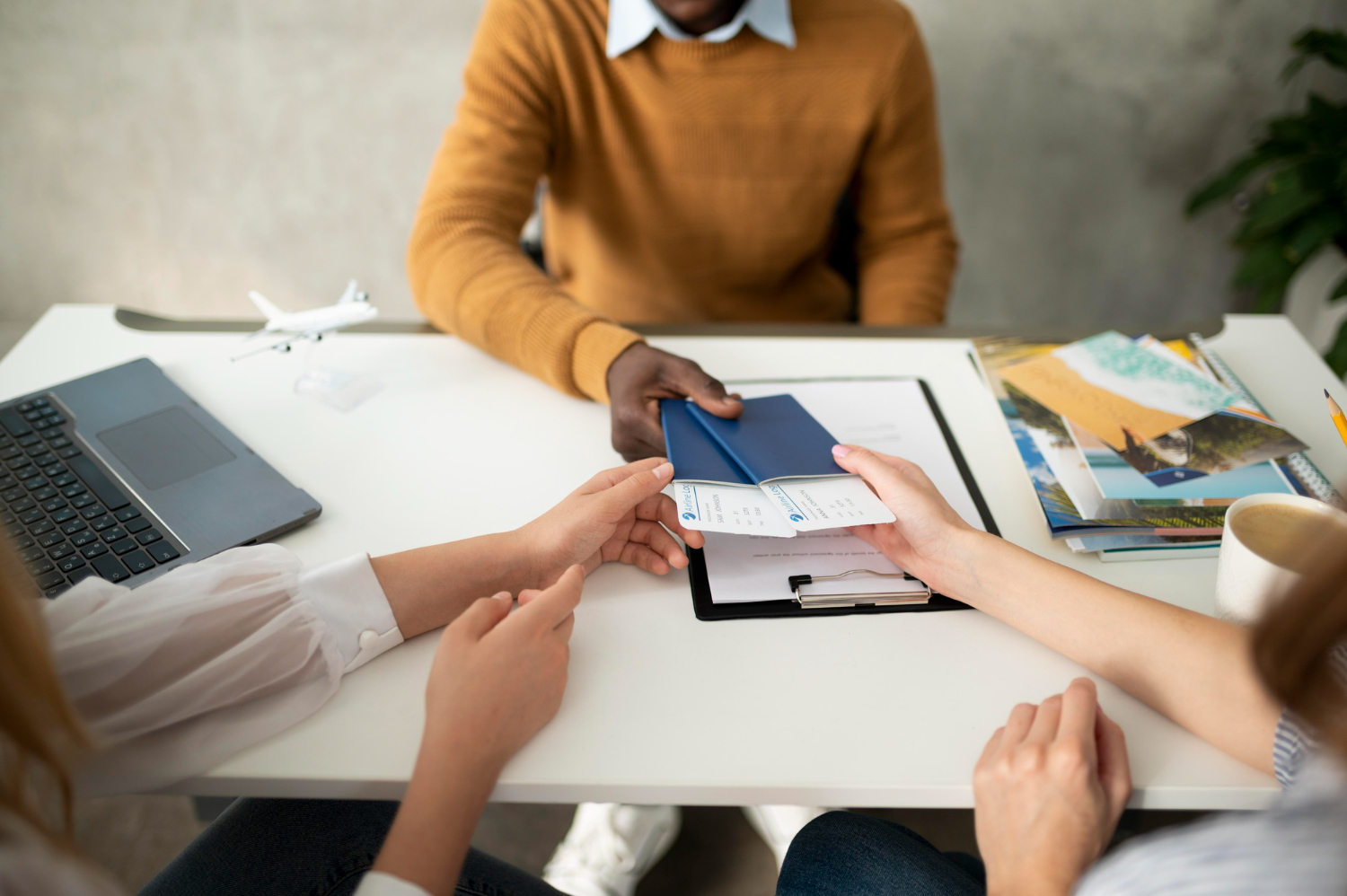 Professional consultation - happy clients discussing immigration services